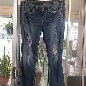 Distressed flare jeans